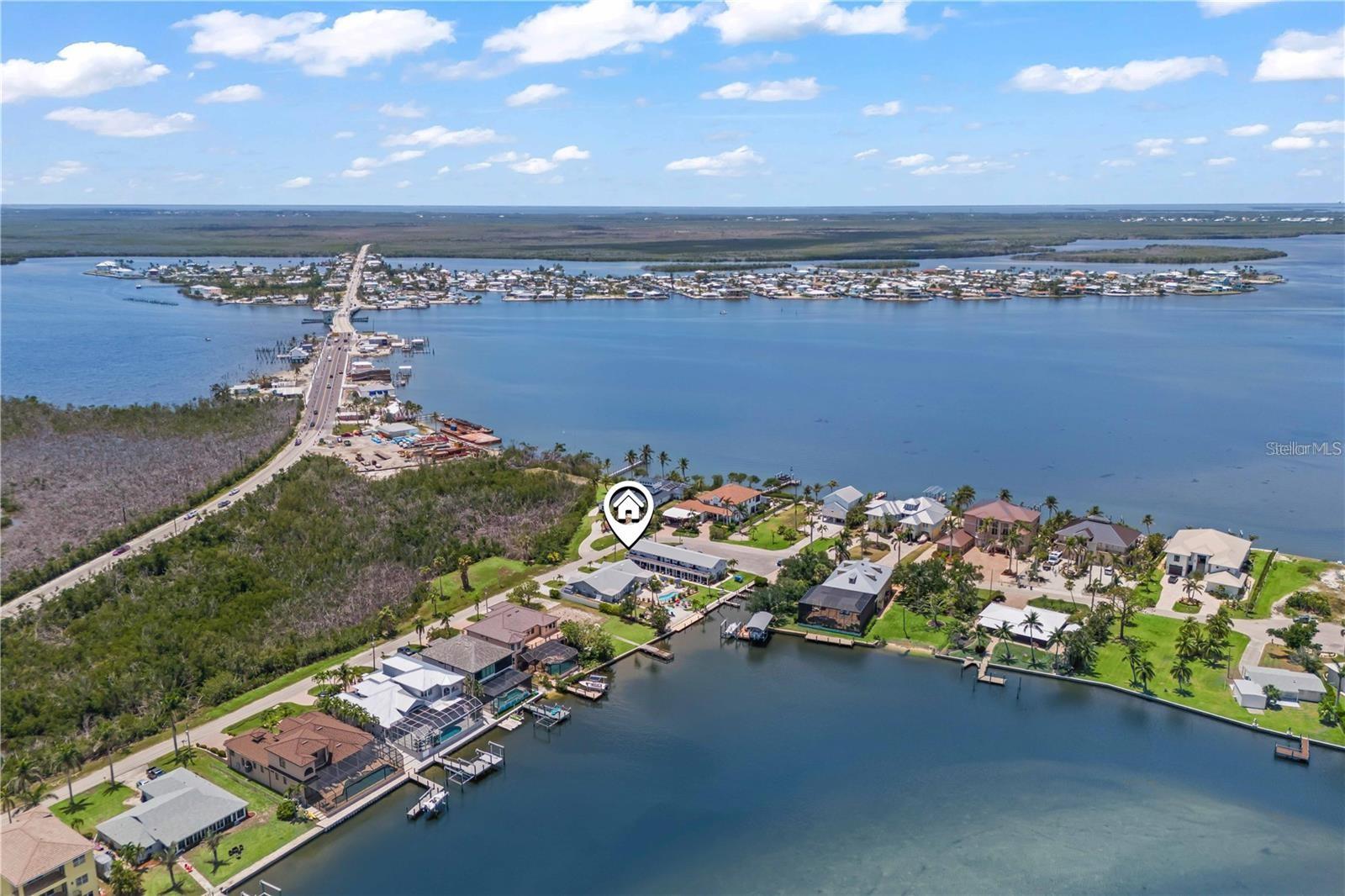 12 Hotel Rooms and 5 Boat Slips For Sale in Matlacha, FL $3,250,000